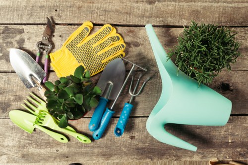 Front view of gardener assessing a residential garden
